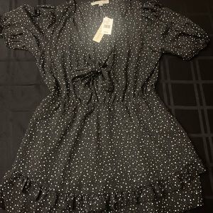 Super cute romper dress. It has shorts underneath.